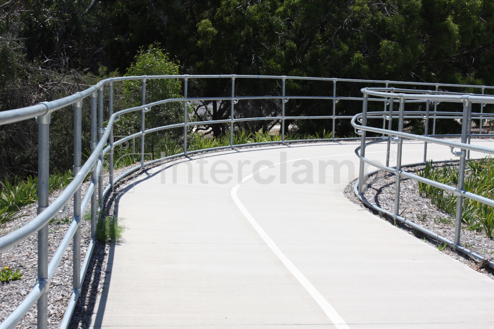 Balustrade on cycle path with disability handrail